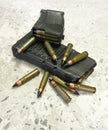 Two rifle mags with bullets on the floor Royalty Free Stock Photo